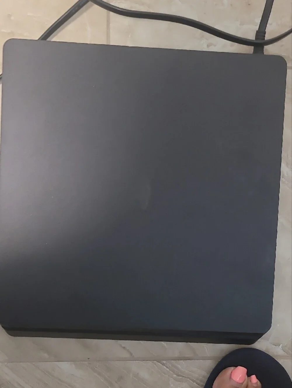 Sony Black PS4 Slim Console with Two Black DualShock Controllers
